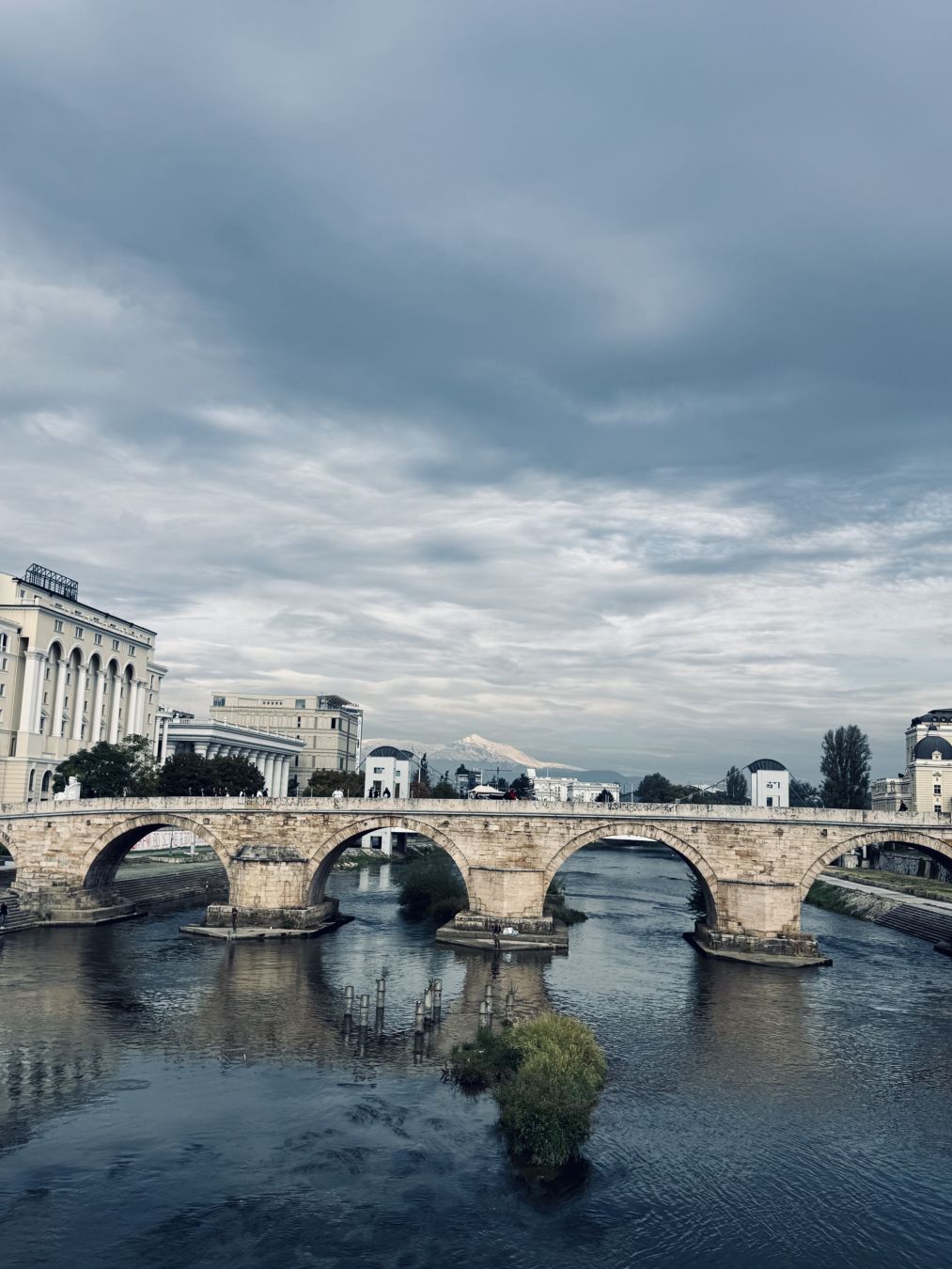 The old stone bridge #КаменМост from the east. In the far background one can see the snow covered peaks of the Sharr mountains.